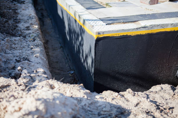 Professional Exterior Waterproofing technician working in Melrose Park, NY